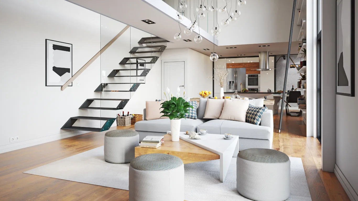 Salon lumineux en duplex avec escalier suspendu, canapé gris et table basse en chêne